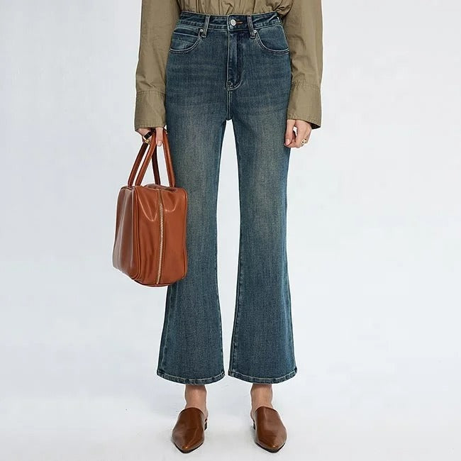 Blue high-waist cropped flare jeans with faded wash
