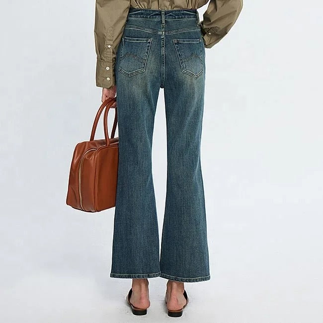 Blue high-waist cropped flare jeans with faded wash