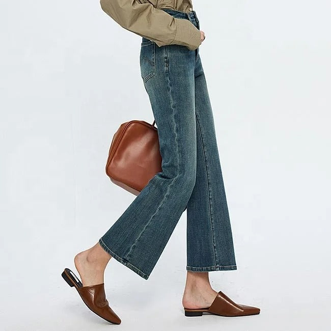 Blue high-waist cropped flare jeans with faded wash