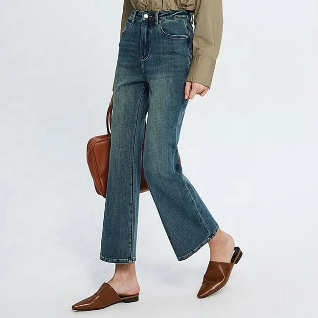 Blue high-waist cropped flare jeans with faded wash