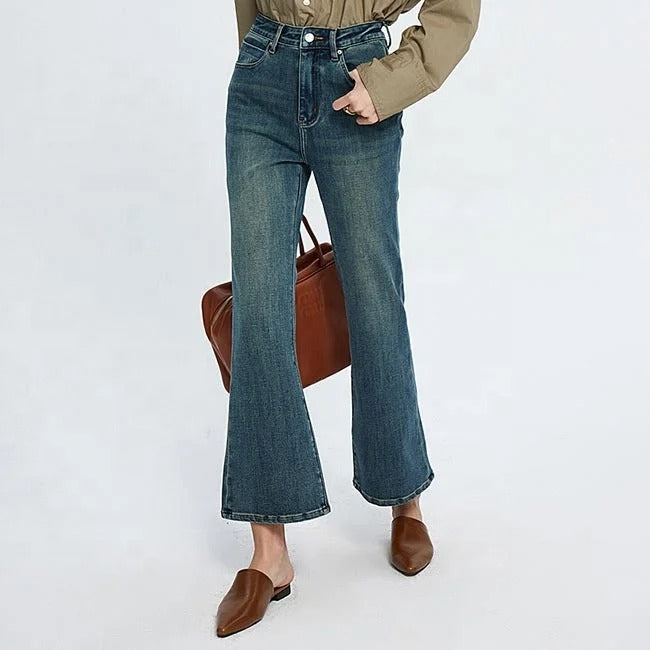 Blue high-waist cropped flare jeans with faded wash