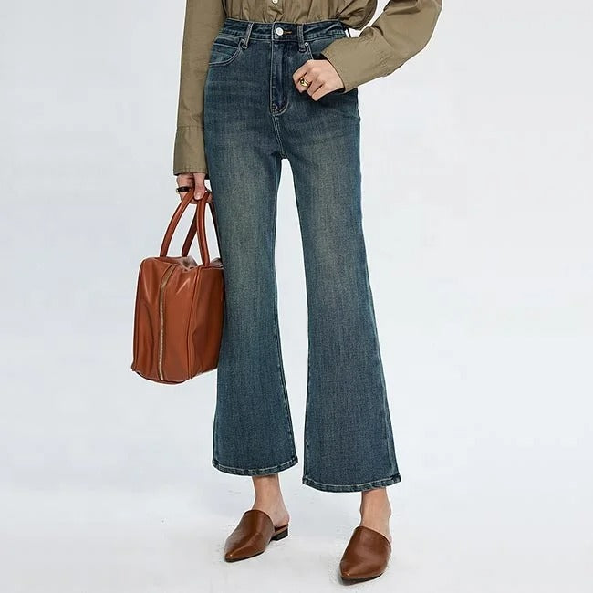 Blue high-waist cropped flare jeans with faded wash