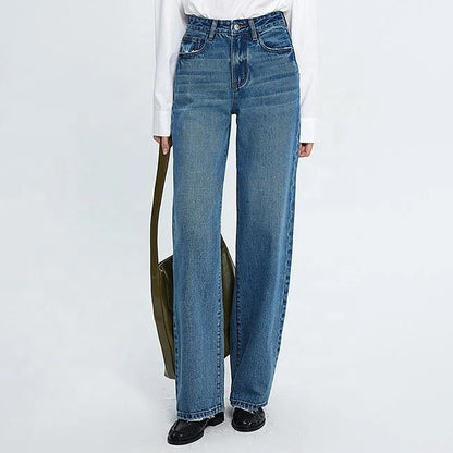 Blue high-waist straight leg jeans with faded panels