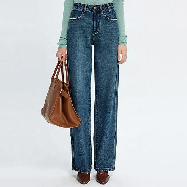 Blue high-waist straight leg jeans with faded wash