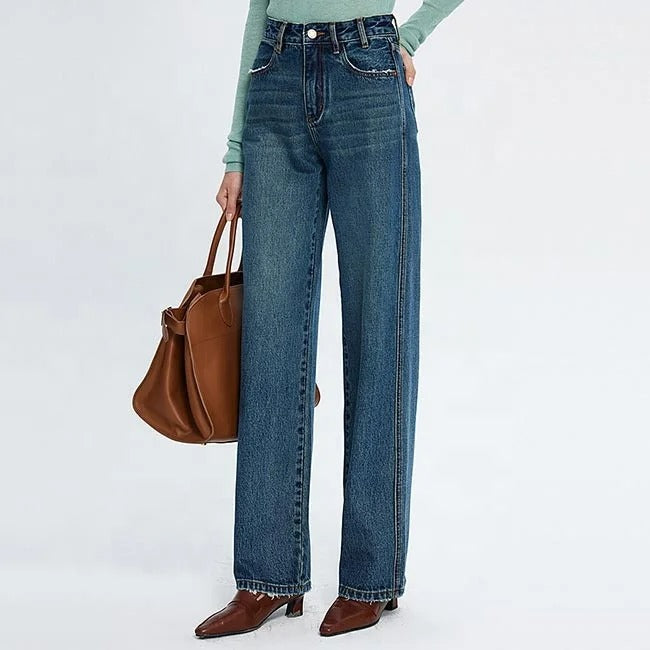 Blue high-waist straight leg jeans with faded wash