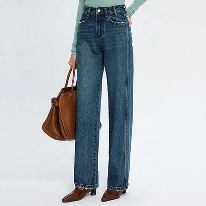 Blue high-waist straight leg jeans with faded wash