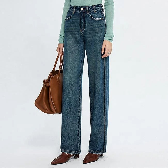 Blue high-waist straight leg jeans with faded wash