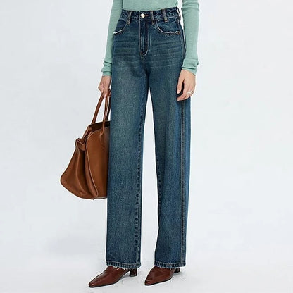 Blue high-waist straight leg jeans with faded wash
