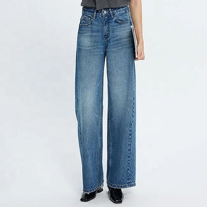 Blue high-waist wide leg jeans with faded wash