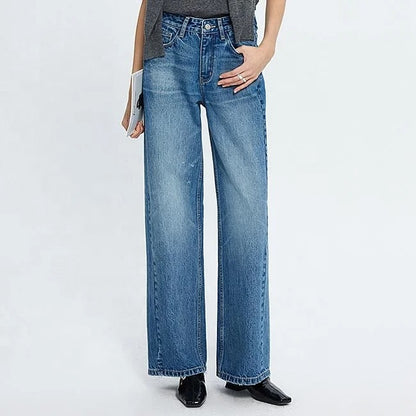 Blue high-waist wide leg jeans with faded wash