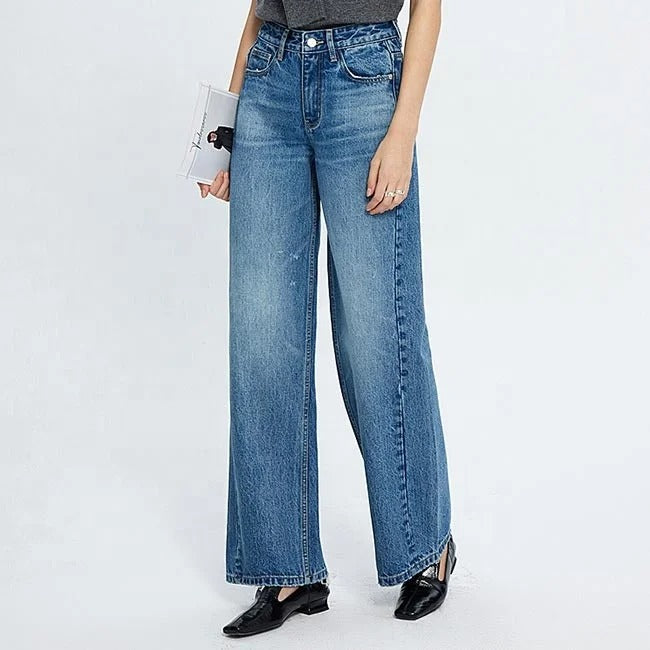 Blue high-waist wide leg jeans with faded wash